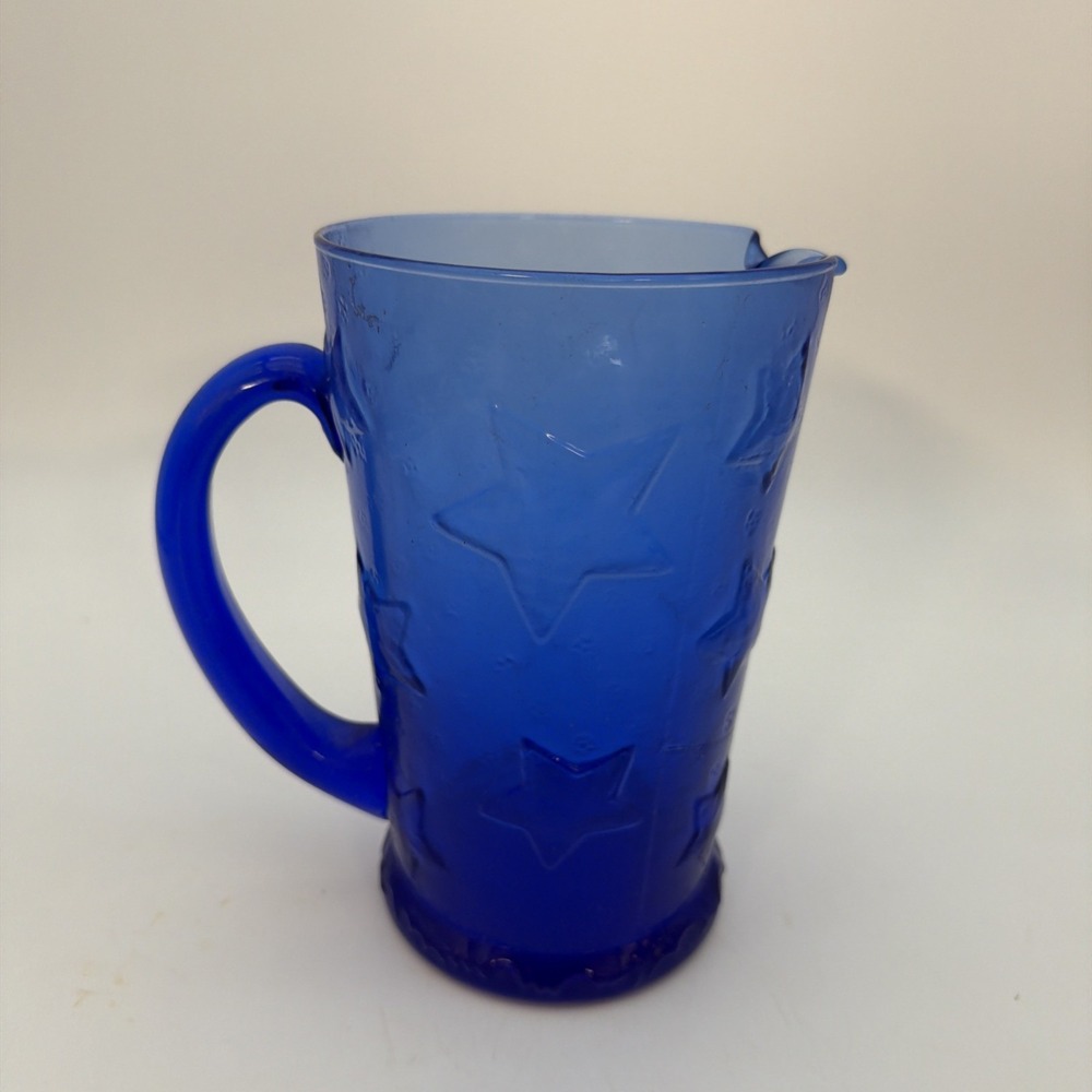vintage cobalt blue glass pitcher With Stars